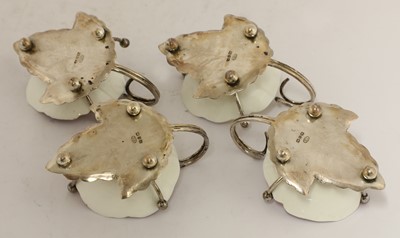 Lot 46 - A set of four silver and pottery cups