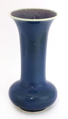 Lot 149 - A Ruskin blue glazed vase