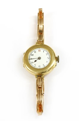Lot 228 - A ladies' 18ct gold pin set mechanical bracelet watch