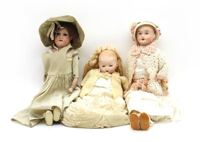 Lot 144 - Three bisque head dolls