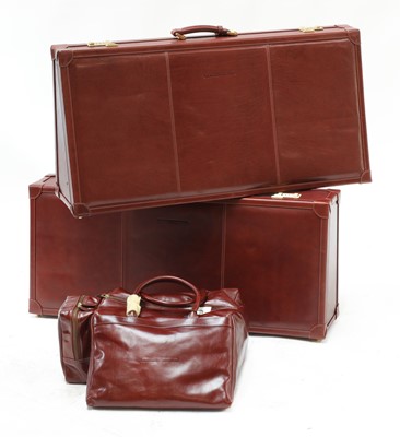 Lot 149 - A set of three 'bespoke luggage' leather cases