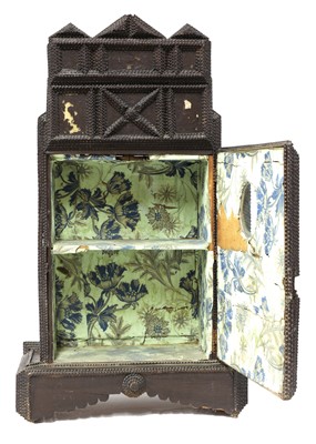 Lot 793 - A French tramp art cabinet