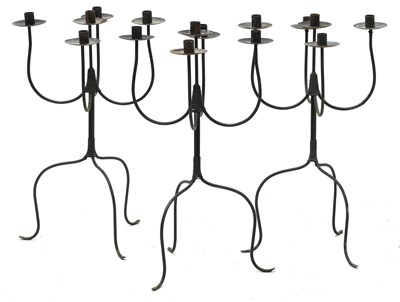 Lot 145 - A set of three steel five-light candelabra