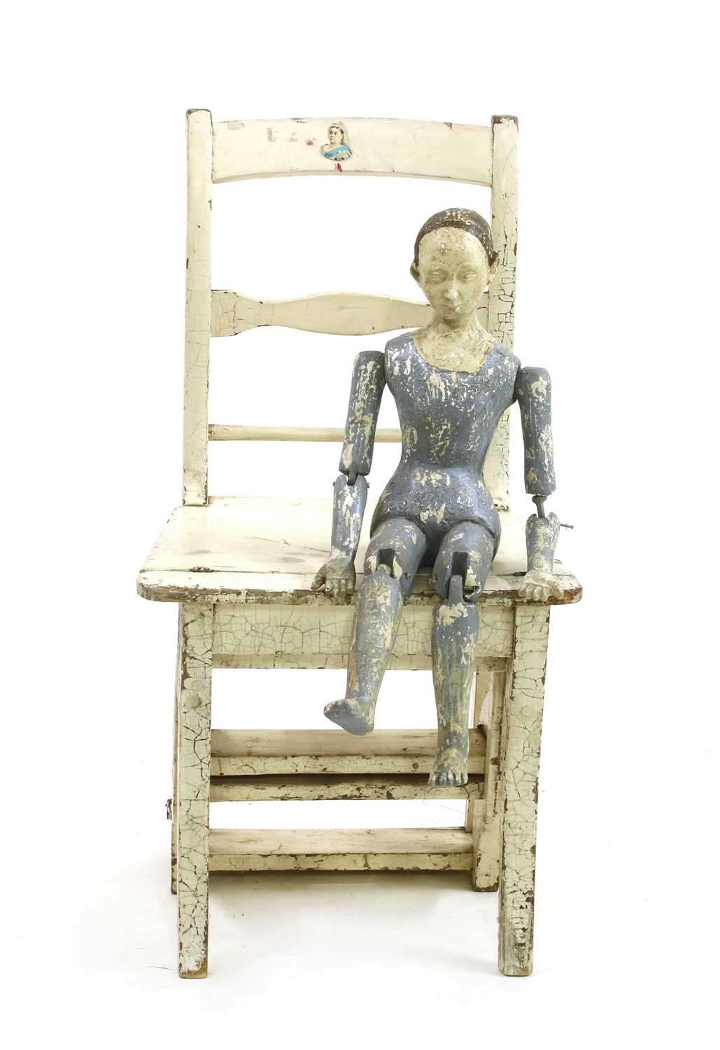 Lot 159 - A 20th century blue and white seated plaster figure