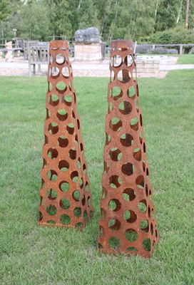 Lot 322 - A pair of pierced garden obelisks
