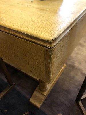 Lot 504 - An Heal's oak library table