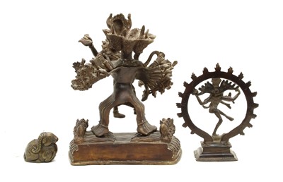 Lot 177 - An Indian bronze group of a dancing girl and a mythical creature