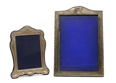 Lot 111 - A silver photo frame of shaped form