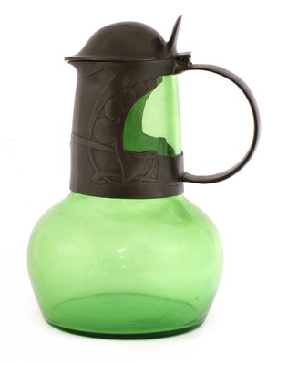 Lot 124 - A Tudric pewter and green glass claret jug and cover