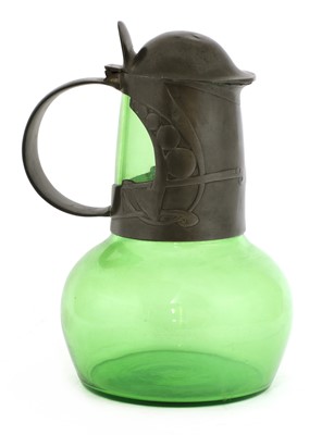 Lot 124 - A Tudric pewter and green glass claret jug and cover