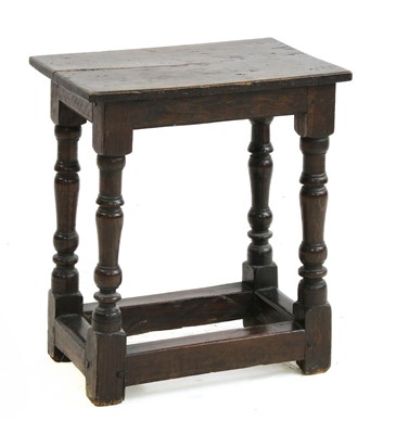 Lot 581 - An 18th century and later oak joint stool