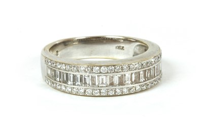 Lot 145 - An 18ct white gold three row diamond half eternity ring