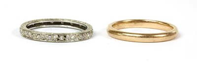 Lot 147 - A white gold diamond full eternity ring