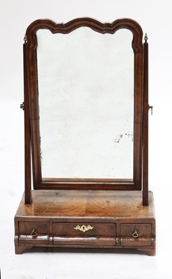 Lot 769 - A walnut and feather banded dressing table mirror