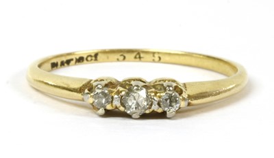 Lot 160 - A gold three stone diamond ring