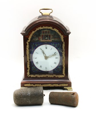 Lot 223 - A Chinese wall clock with two weights