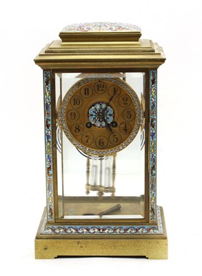 Lot 95 - A late 19th century brass cased four glass mantel clock