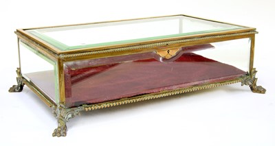 Lot 855 - A gilt brass tabletop vitrine
