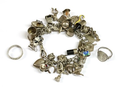 Lot 62 - A silver charm bracelet