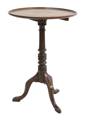 Lot 774 - An oak and mahogany circular table