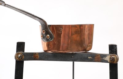 Lot 775 - A graduated set of seven copper saucepans