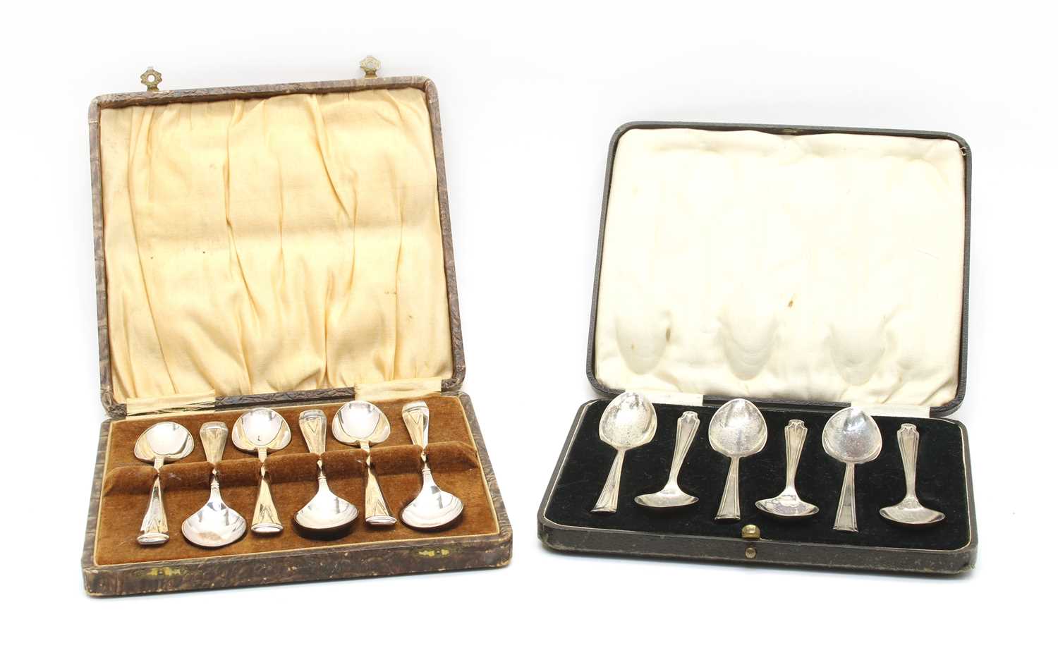 Lot 16 - A cased set of six silver teaspoons by Asprey and Co