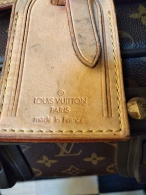 Lot 111 - A Louis Vuitton monogrammed canvas 'Pégase Légère 65' suitcase
