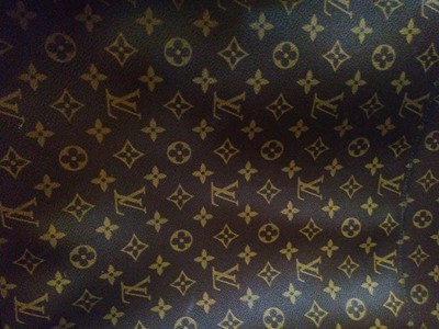 Lot 110 - A Louis Vuitton monogrammed canvas 'Pégase Légère 55' suitcase