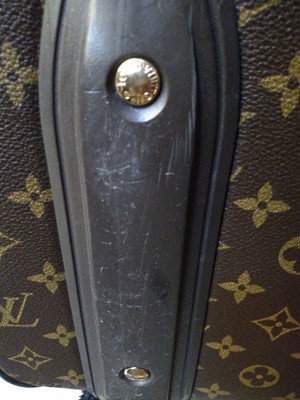 Lot 110 - A Louis Vuitton monogrammed canvas 'Pégase Légère 55' suitcase