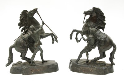 Lot 869 - A pair of bronze Marly horses