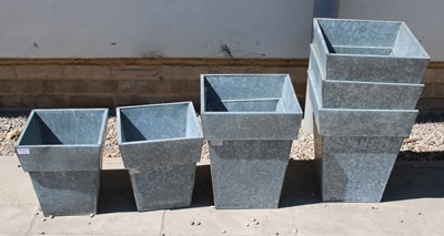 Lot 432 - A collection of seven zinc planters