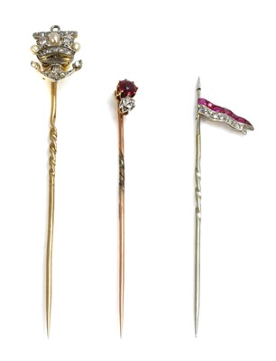 Lot 50 - Three diamond set stick pins