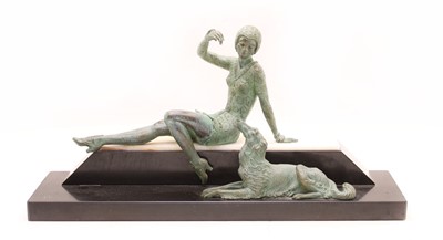 Lot 193 - An Art Deco style bronzed figure of a woman and a dog