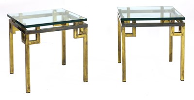 Lot 505 - A pair of brass side tables