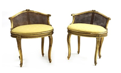Lot 550 - A pair of 20th century gilt double Bergere low back stools