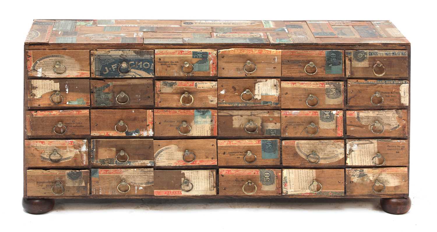 Lot 413 - A cigar box table cabinet of thirty drawers