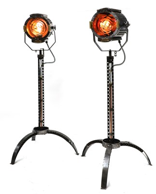 Lot 409 - A pair of steel, copper and brass 'Strand' electric stage lights
