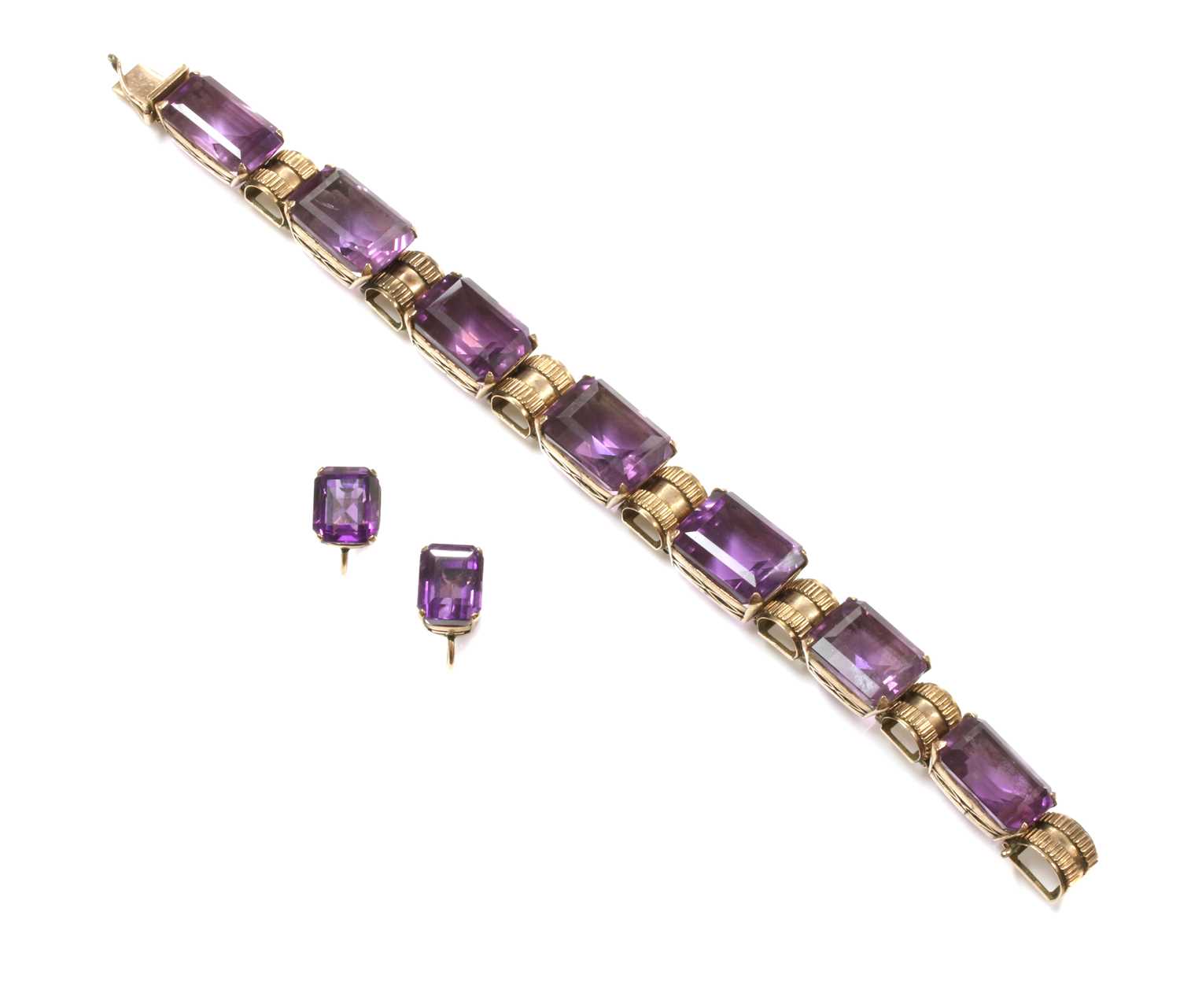 Lot 168 - A rose gold amethyst bracelet and matched earring suite, c.1940