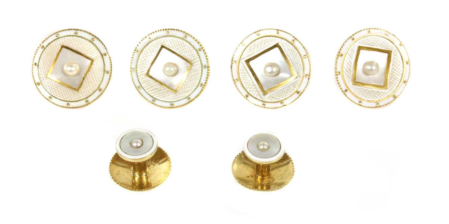 Lot 171 - A cased matched set of two dress studs and four gold mother-of-pearl, pearl and enamel buttons