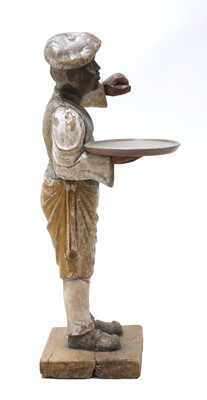 Lot 115 - A Continental carved wooden dumb waiter