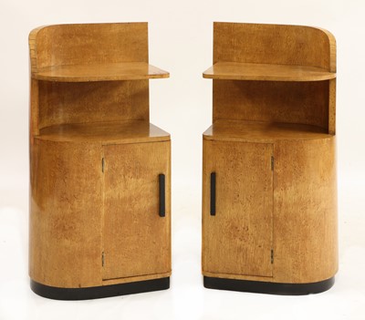 Lot 471 - A pair of Art Deco bird's-eye maple bedside cabinets