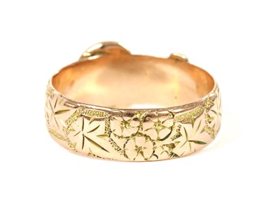 Lot 55 - A 9ct gold buckle ring