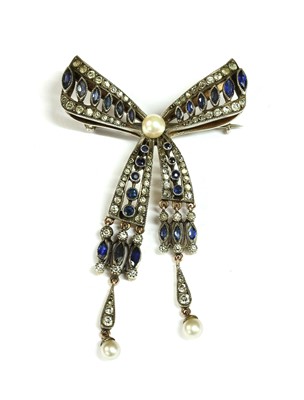 Lot 42 - A silver paste bow brooch