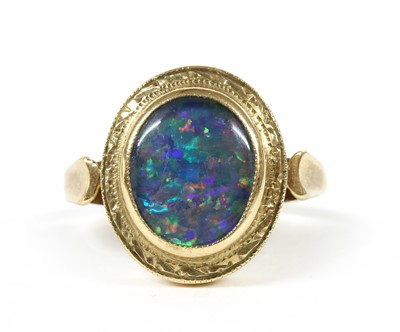Lot 209 - A 9ct gold single stone opal triplet ring