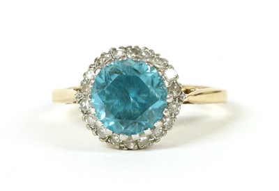 Lot 92 - An 18ct gold blue zircon and diamond cluster ring, c.1960