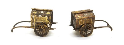 Lot 68 - A pair of Japanese sterling silver and silver gilt miniature rickshaws