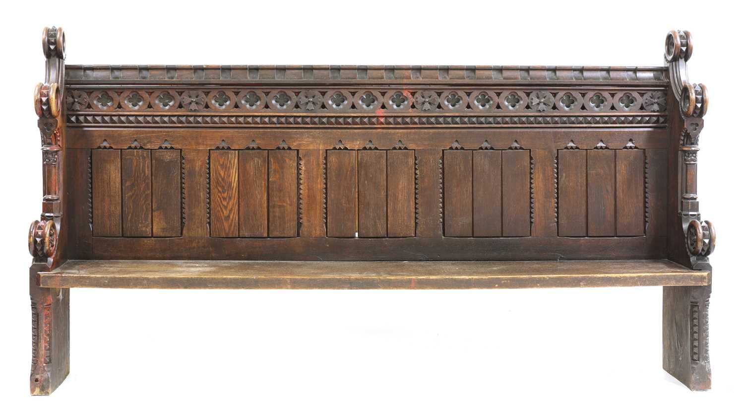 Lot 43 - A carved pew or settle