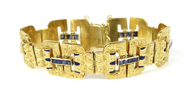 Lot 70 - A Continental gold sapphire and enamel bracelet, c.1930
