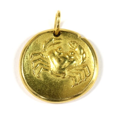 Lot 57 - A French 18ct gold Cancer zodiac pendant, by Georges Lenfant