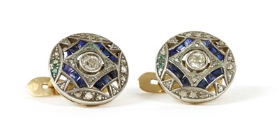 Lot 71 - A pair of Portuguese late Art Deco diamond and sapphire target style earrings
